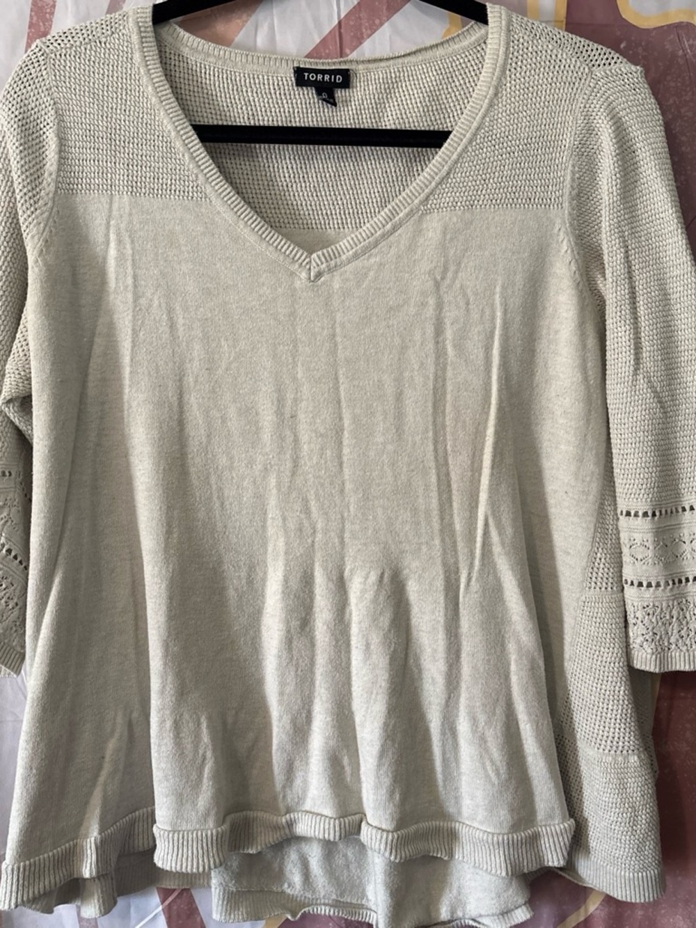 Torrid Cream V-Neck Textured Knit Pullover detail on sleeve and near hips